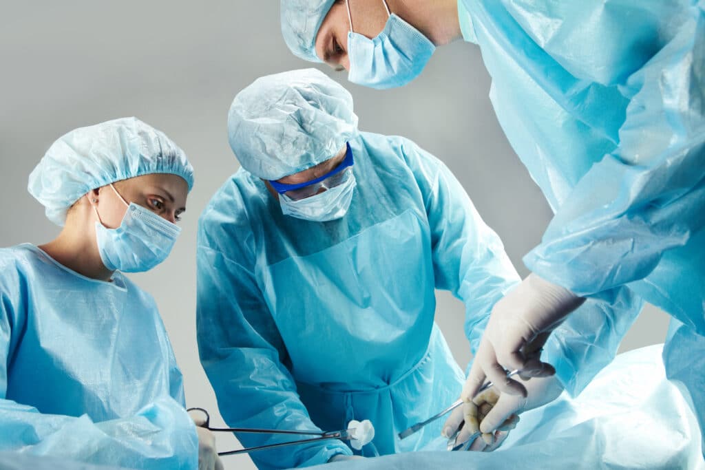 SUrgical team including surgical tech during operation