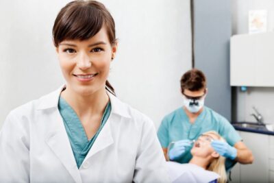 Dental assistant working in a dentist office