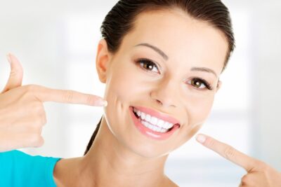 patient with bright teeth after visiting the dental hygienist